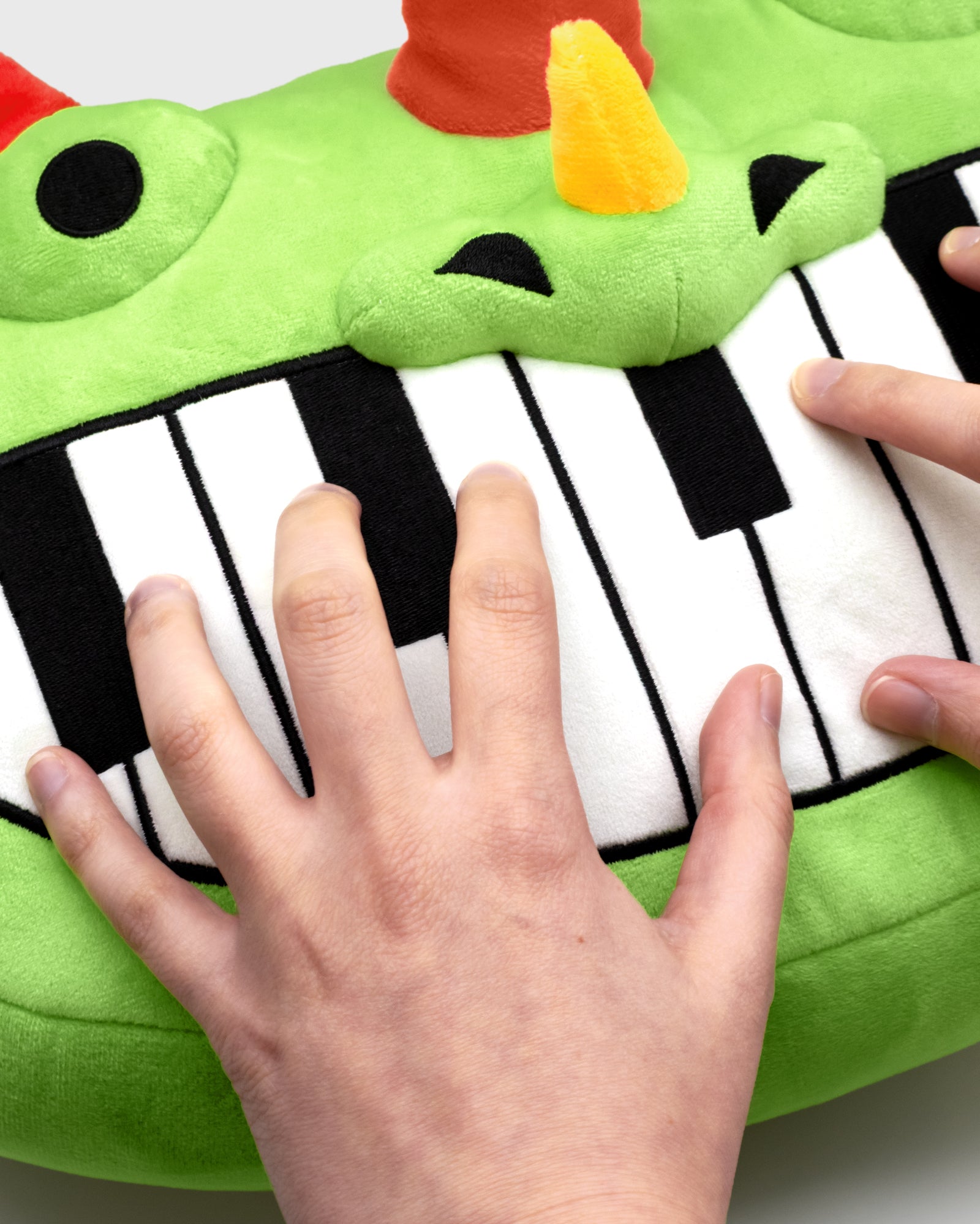 Interactive Pianosaurus Plush Pillow