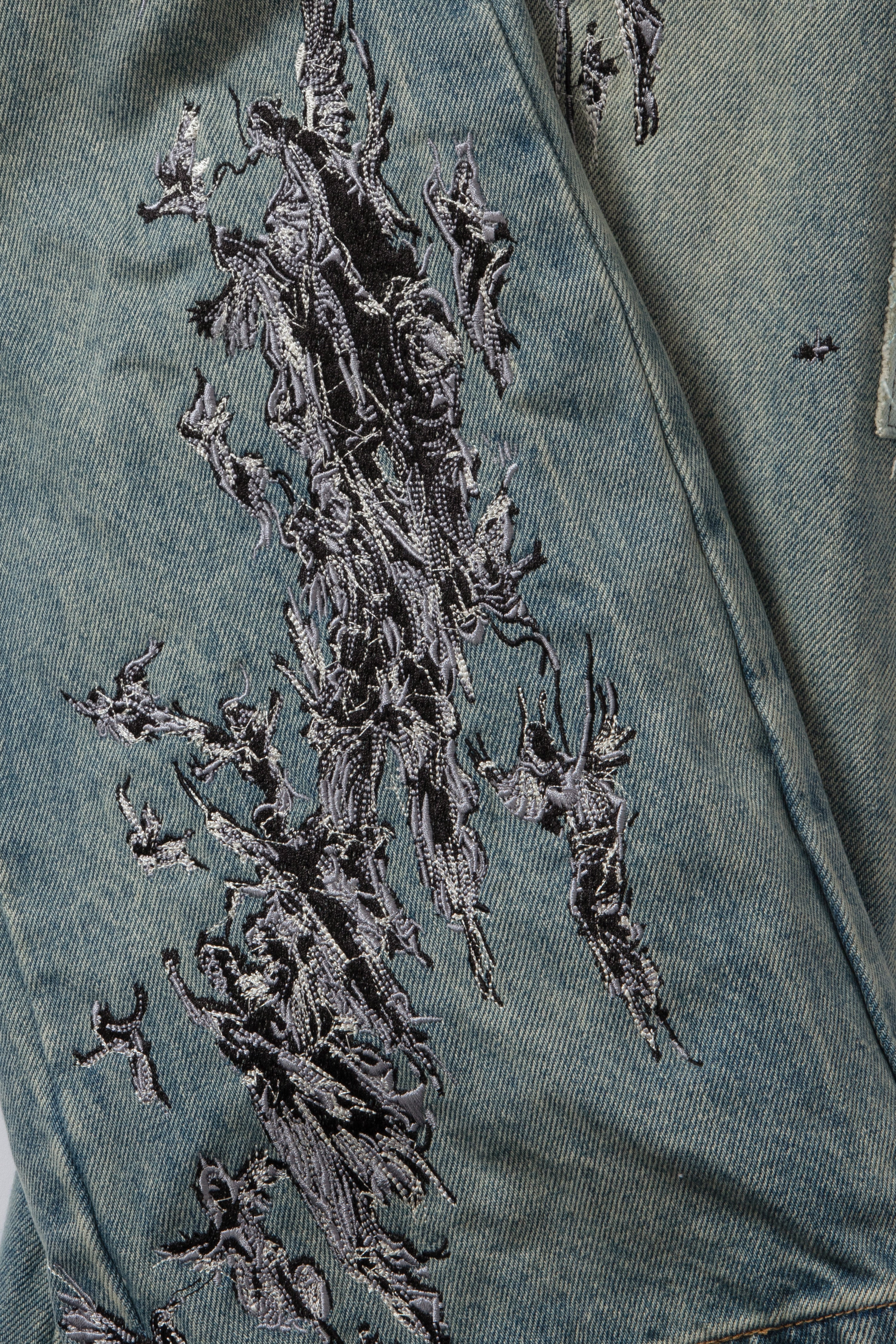 SCRATCHED DENIM