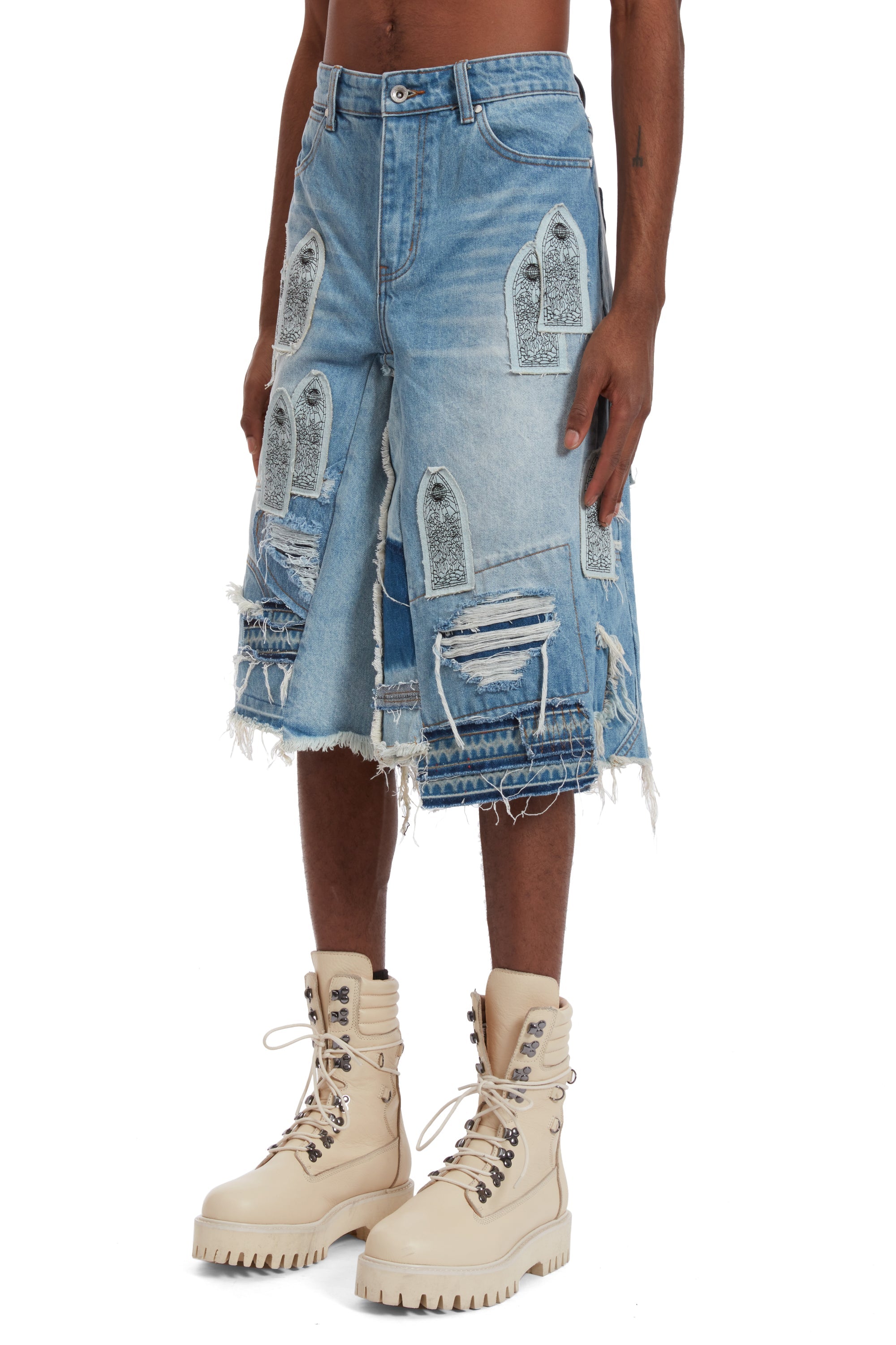PATCHED ARCH BLOWOUT DENIM SHORT