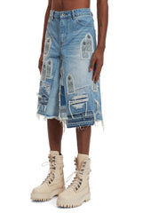 PATCHED ARCH BLOWOUT DENIM SHORT