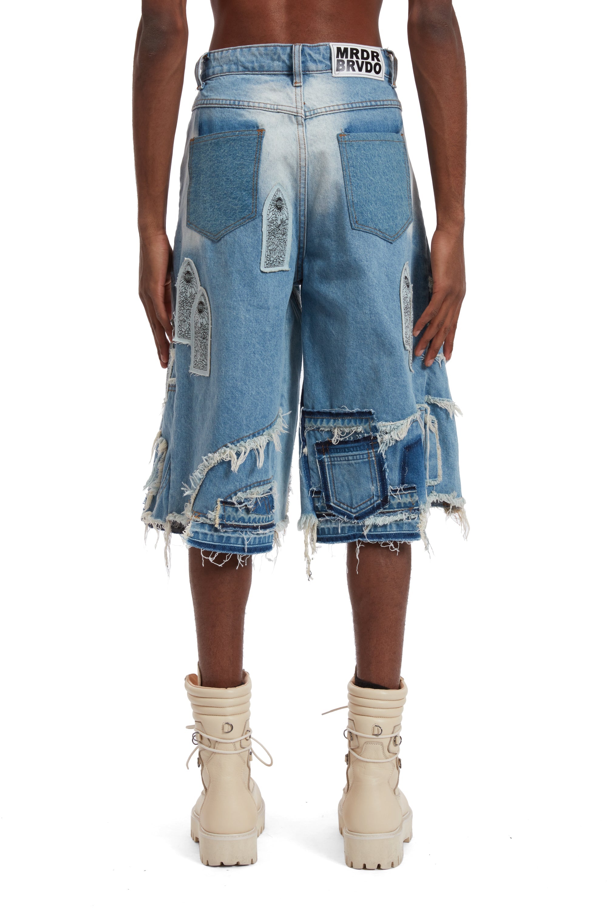PATCHED ARCH BLOWOUT DENIM SHORT