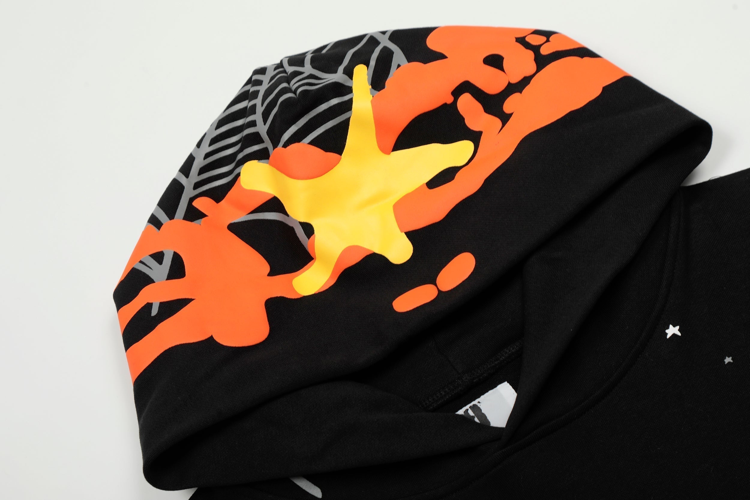 Sp5der Hood‑Print Star Splatter Pullover Hoodie