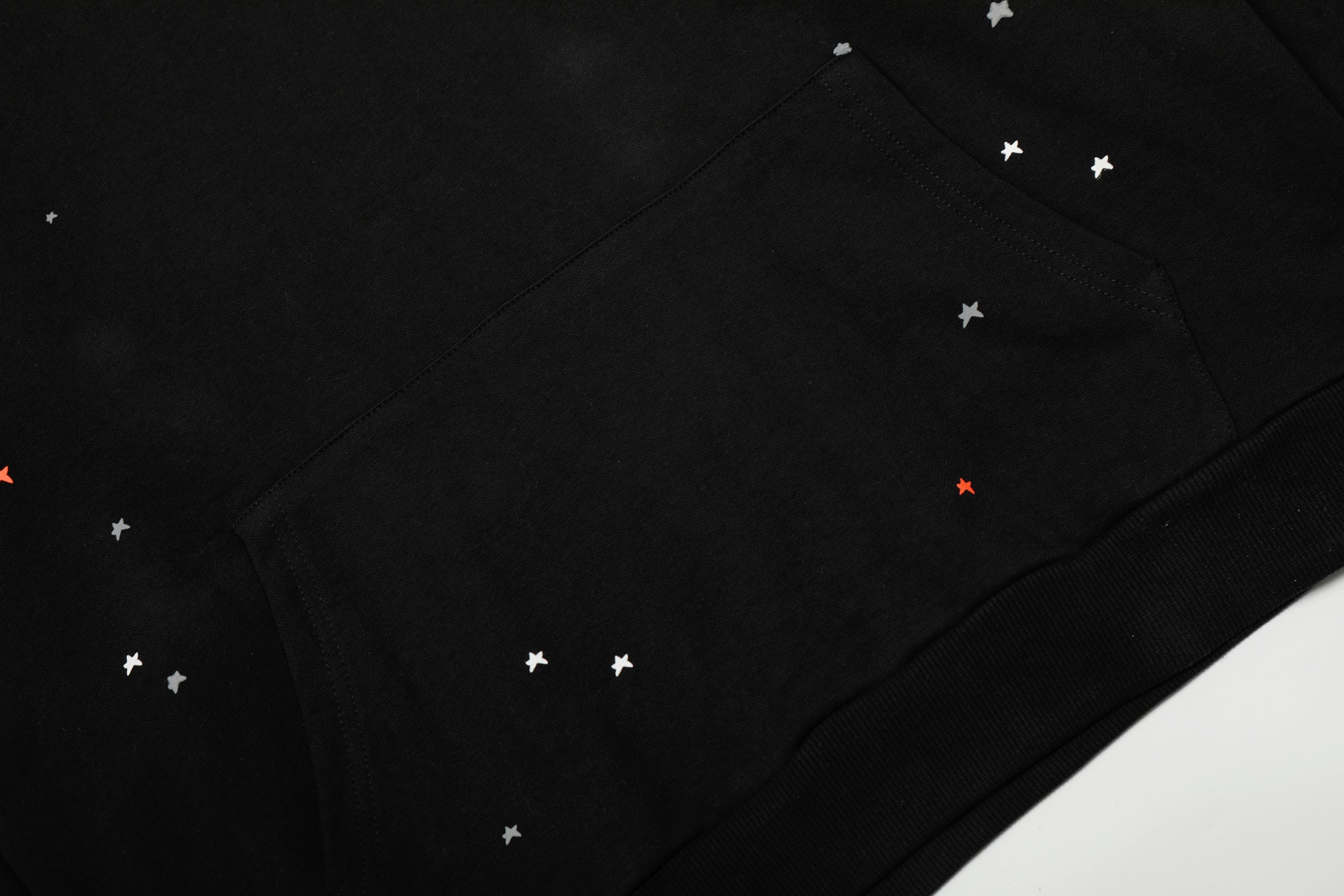 Sp5der Hood‑Print Star Splatter Pullover Hoodie