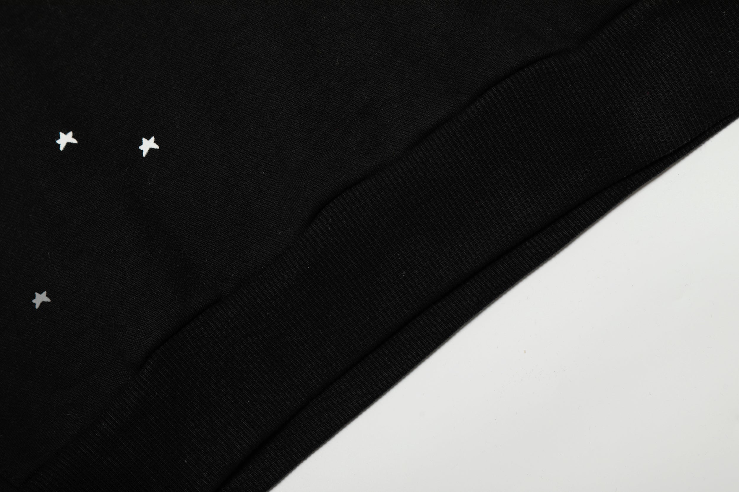 Sp5der Hood‑Print Star Splatter Pullover Hoodie